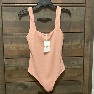 Pink Show me your Mu Mu bodysuit